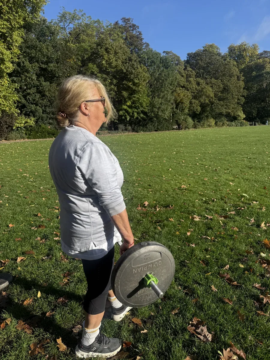Client training outdoors in Battersea Park with personal trainer Dan Edwards